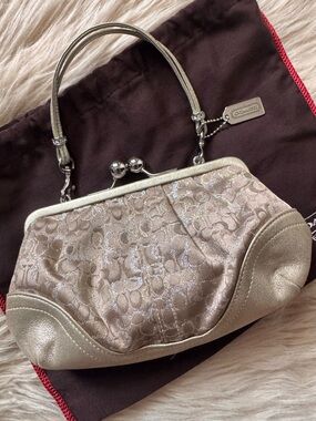 Coach Metallic Champagne Signature Frame Wristlet